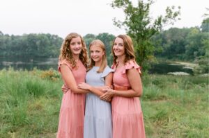 Daughters with mother at Lowry Hills Nature Center in Victoria, MN